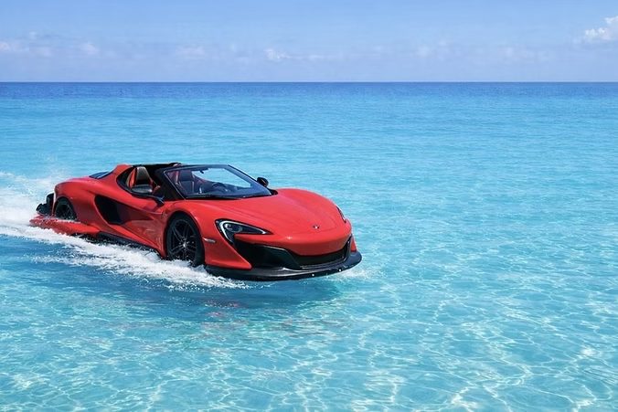 Red Jet Car cruising on clear shallow water